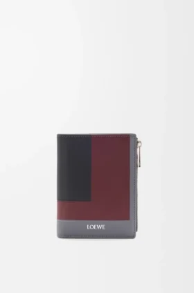 Cartera compacta y estilizada de piel de becerro napa
