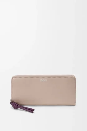 Cartera con cremallera envolvente «Knot» en piel de becerro napa brillante