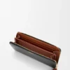 Cartera con cremallera envolvente «Knot» en piel de becerro napa brillante