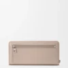 Cartera con cremallera envolvente «Knot» en piel de becerro napa brillante