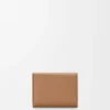 Cartera de tres pliegues «Pebble» en piel de becerro con grano «Pebble»