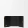 Cartera vertical pequeña de piel de becerro lisa y granulada