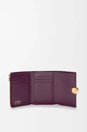 Cartera vertical pequeña «Pebble» de piel de becerro con grano «Pebble»