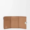 Cartera vertical pequeña «Pebble» de piel de becerro con grano «Pebble»