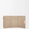 Cartera vertical pequeña «Pebble» en piel de becerro napa brillante