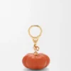 Dije de calabaza en piel de cordero