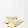 Mules con nudo Flamenco de piel de cordero