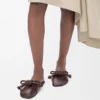 Mules con nudo Flamenco de piel de cordero