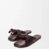 Mules con nudo Flamenco de piel de cordero